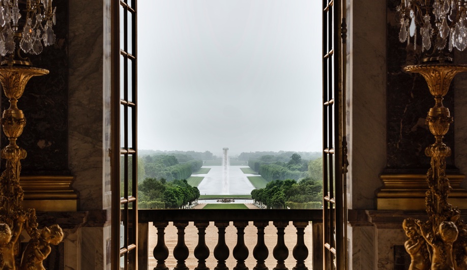 Waterfall, an installation from Eliasson's Versailles, as seen from inside the palace.