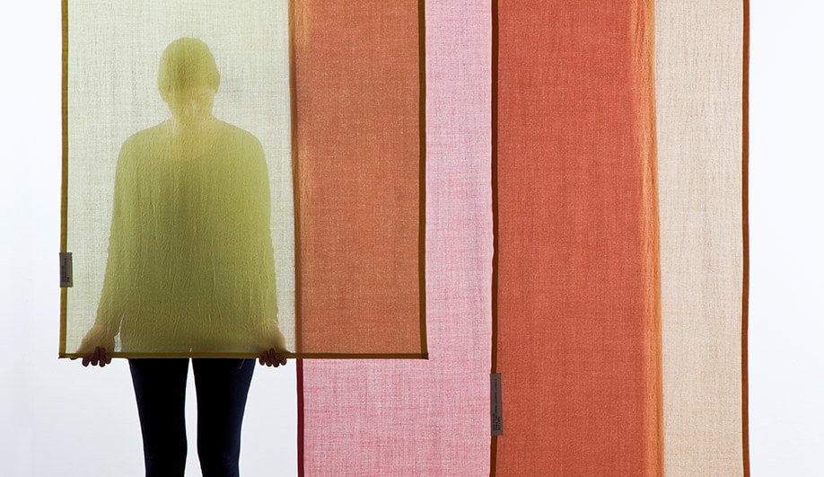 Eindhoven studio Raw Color plays with hue gradation through the layering of sheer curtain panels.