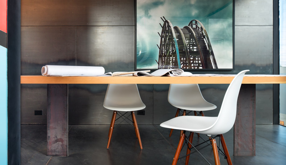 The largest unit features a conference table and custom glass slider.