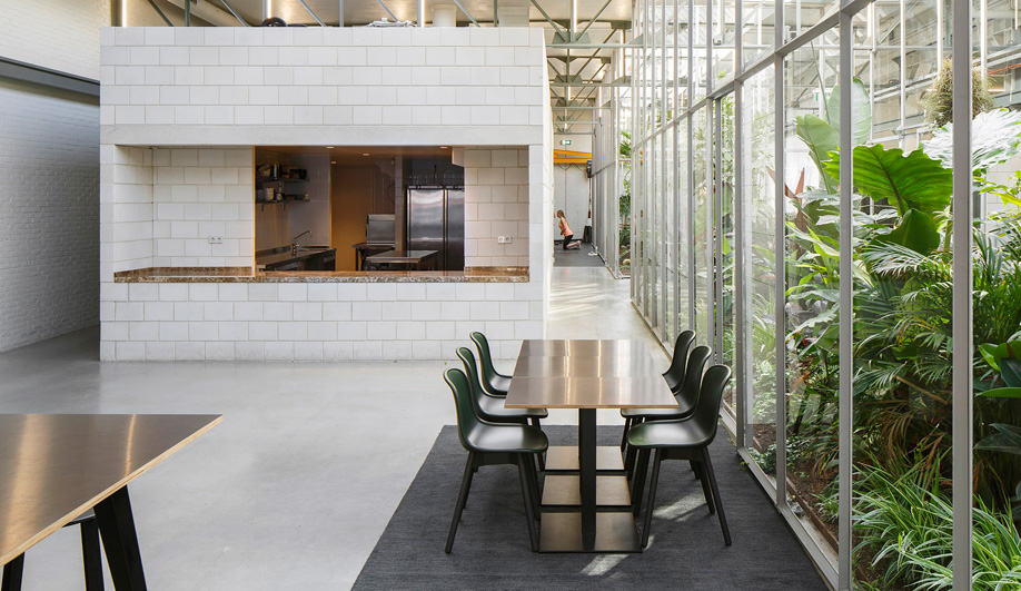 The white cube is a self-contained kitchen that features a stove by Piet Hein Eek.
