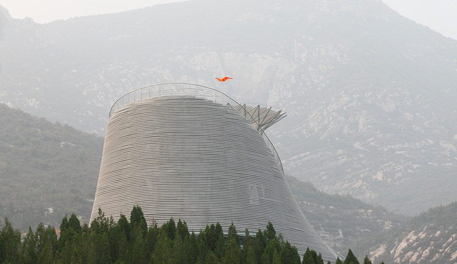 A Circular Steel Structure on a Hilltop in China Lets Monks Fly