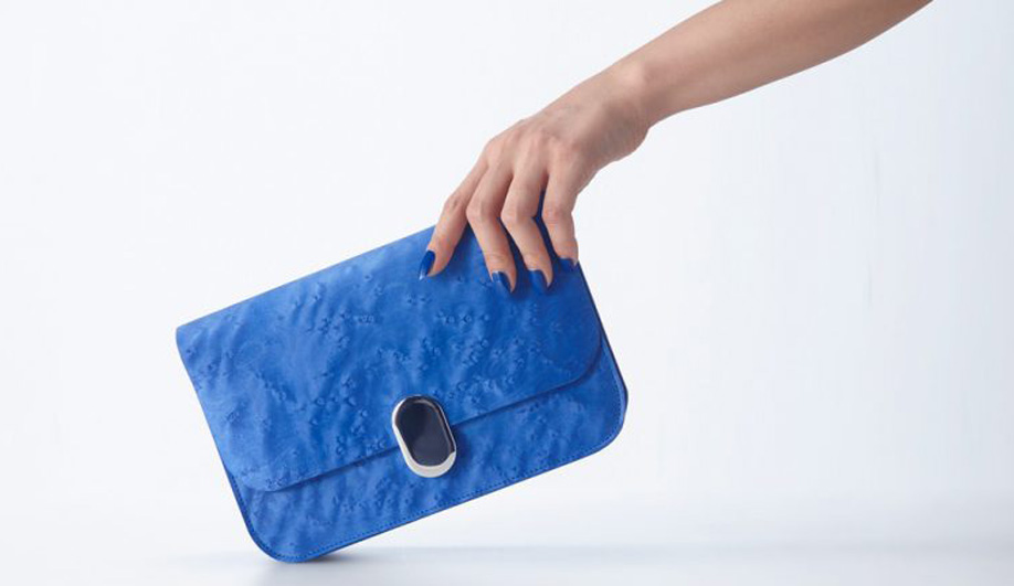 The Supple bag by Tokyo studio Design For Industry is made by bonding natural leather to brilliantly dyed birdseye maple veneer.