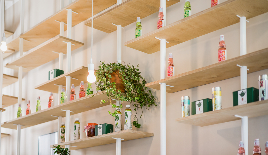 Japanese products line the walls of Warsaw's Vegan Ramen Shop.