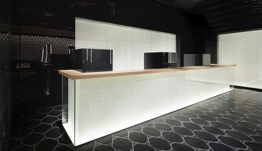 Paper made from thinly spread cotton pads adorn some walls of the Nendo redesign of the Shiseido flagship.