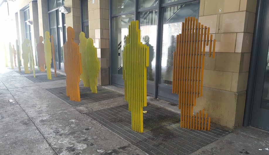 Selena Savic's Unpleasant Design explores hostile architecture, like these metal silhouettes from one of Calgary's CTrain stations.