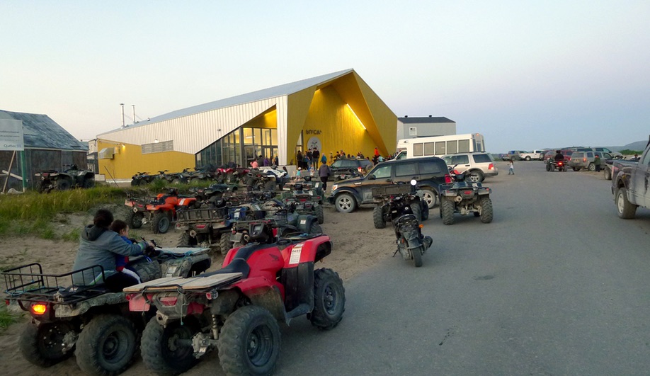 All-terrain vehicles gather outside a Nunavik cultural centre in Kuujjuaraapik