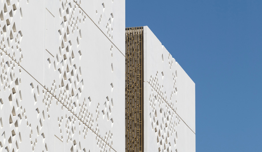 The white concrete façade at the Palace of Justice Courthouse.