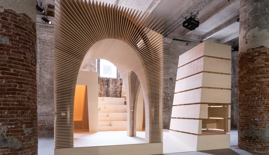 In the Arsenale, Recasting by Alison Brooks Architects draws elements from various projects and recasts them as four inhabitable timber totems. (Photo by Andrea Avezzù, courtesy of La Biennale di Venezia.)