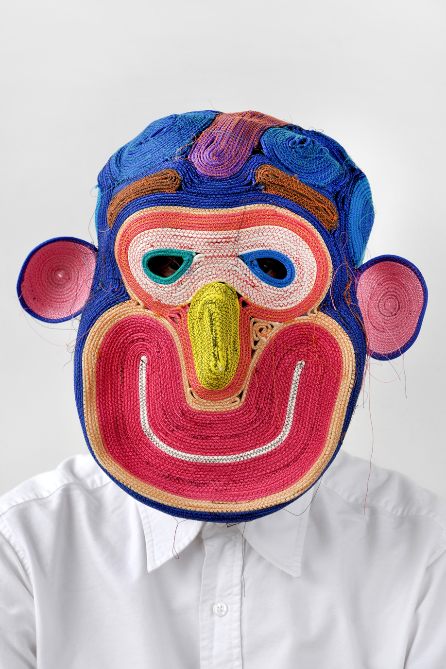 Designer Bertjan Pot with a colourful rope-woven mask