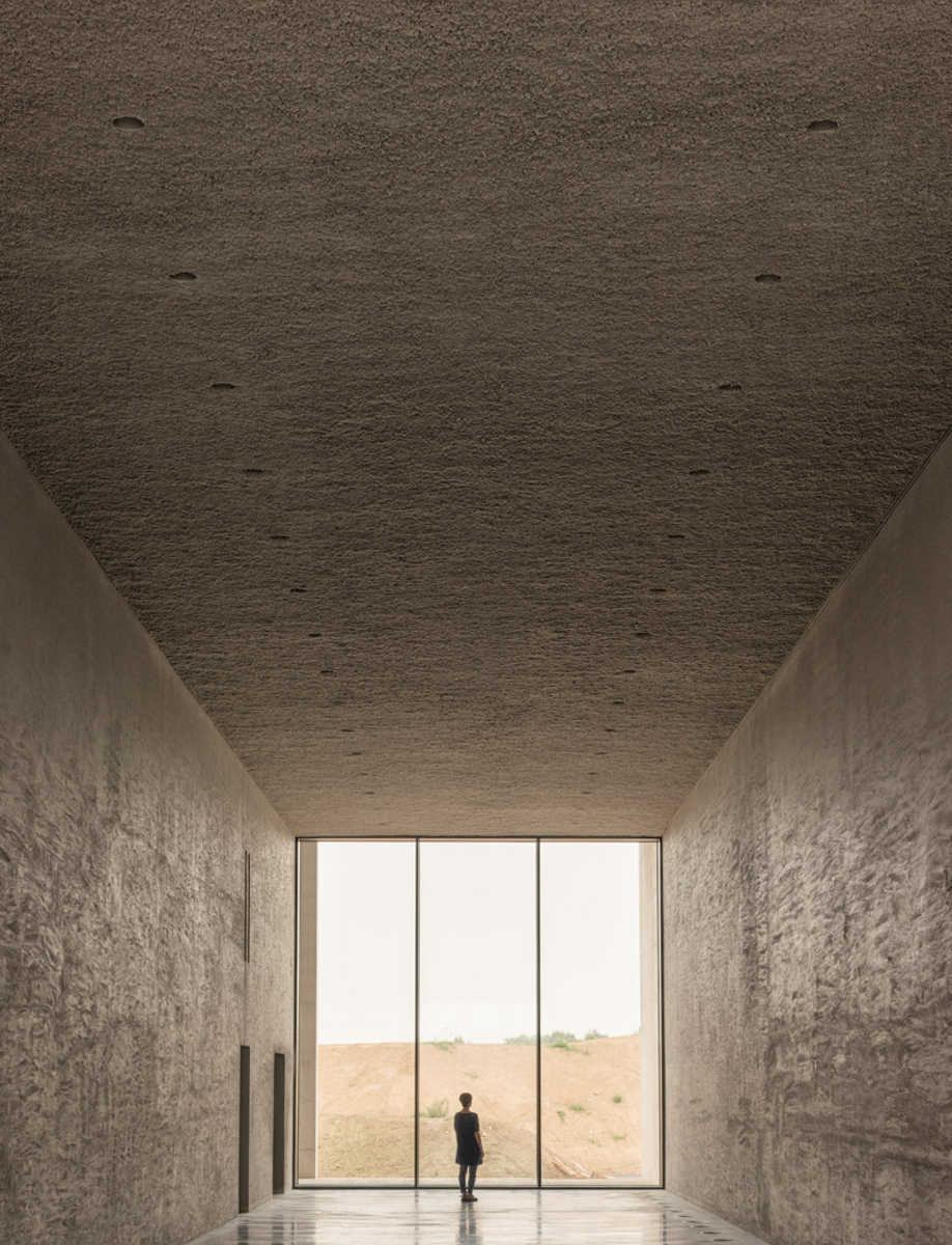 Floor-to-ceiling windows in KAAN Architecten's modernist Crematorium Siesegem