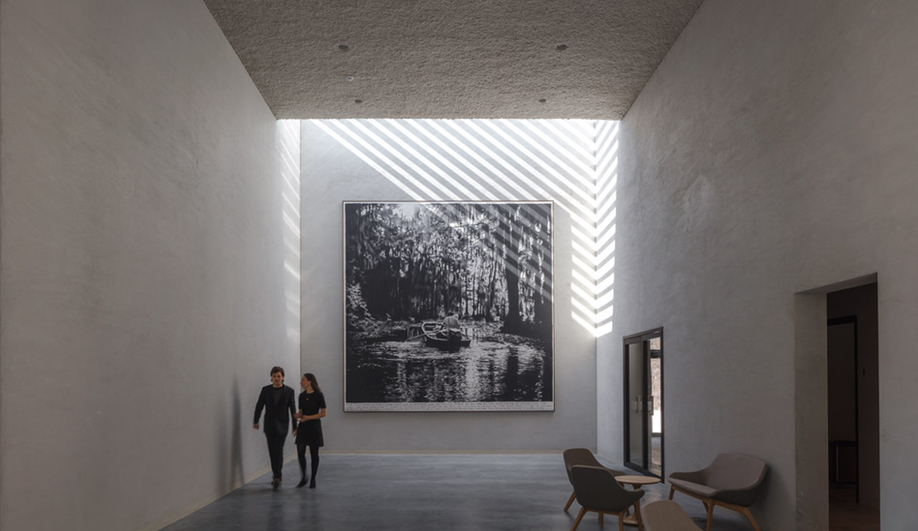 A hallway in KAAN Architecten's modernist Crematorium Siesegem