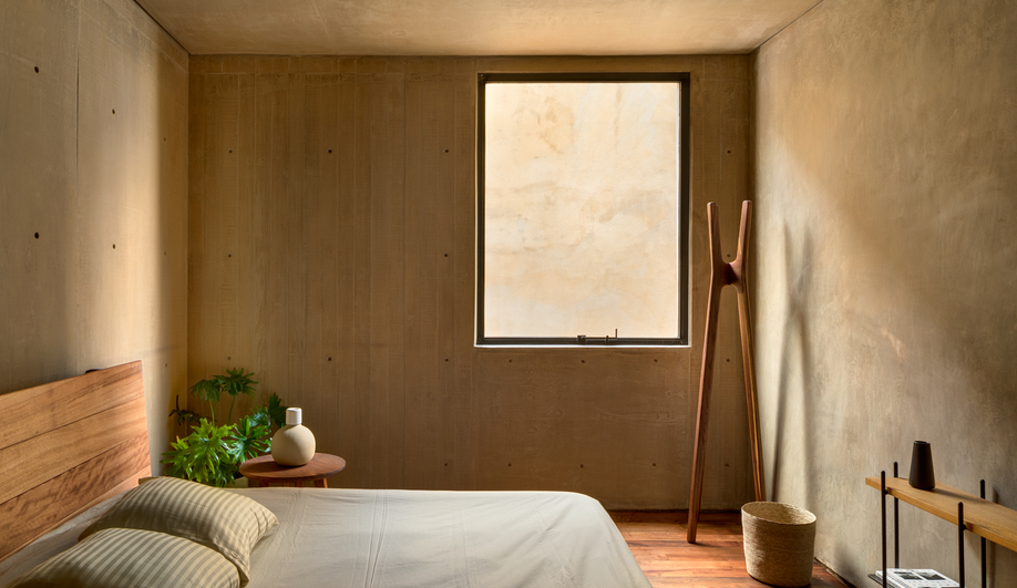 A bedroom in Taller Héctor Barroso's LC710 in Mexico City