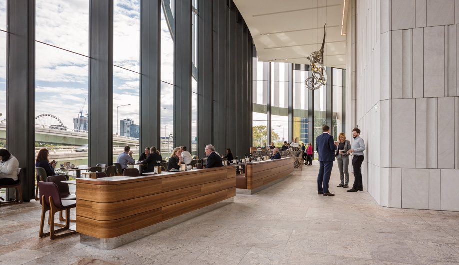 A gathering space in 1 William Street, a village-inspired government office building designed by Woods Bagot.