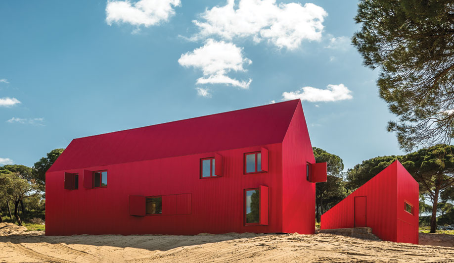 A Bright Red, Dramatically Peak-Roofed Home in Portugal